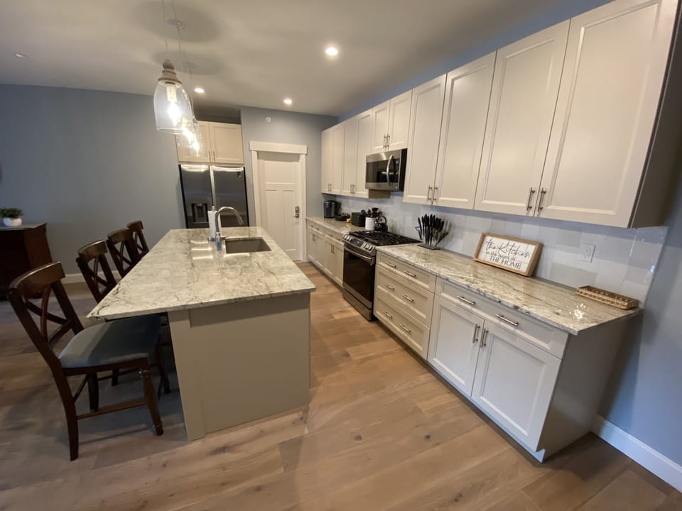 Enter into this spacious, fully stocked kitchen.  