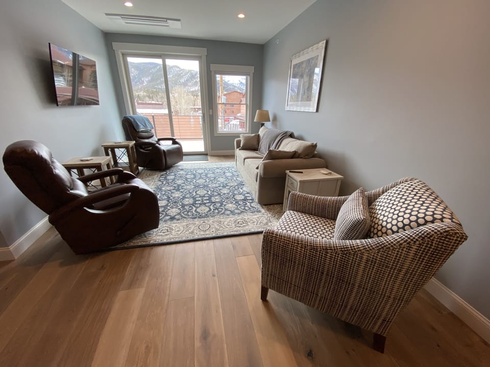 Sit and relax in the comfortable living room.  Queen sofa bed.