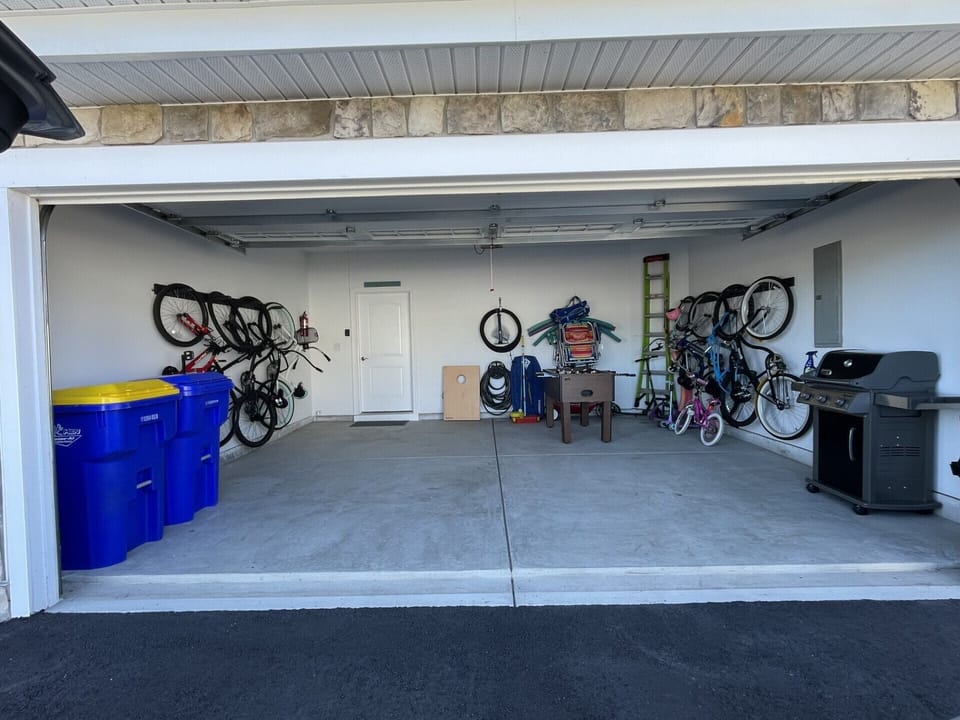  9 bikes for all ages, beach chairs,BBQ grill, foosball table, cornhole 