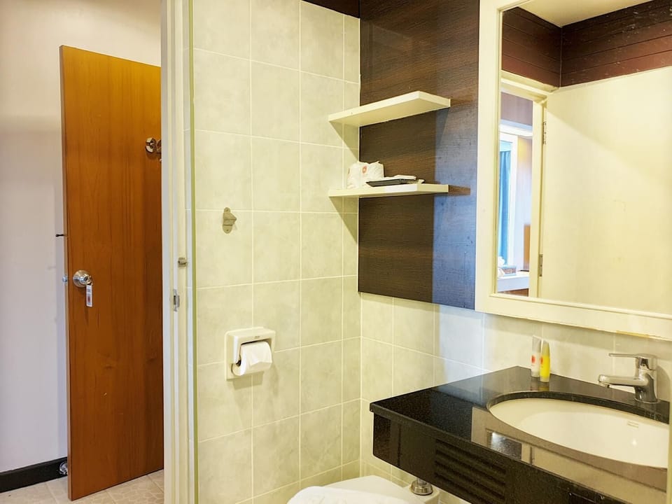 Shower, free toiletries, slippers, towels