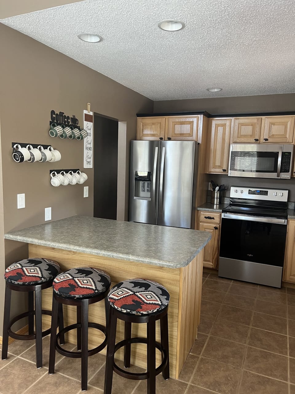 Open kitchen fully stocked for all your cooking needs