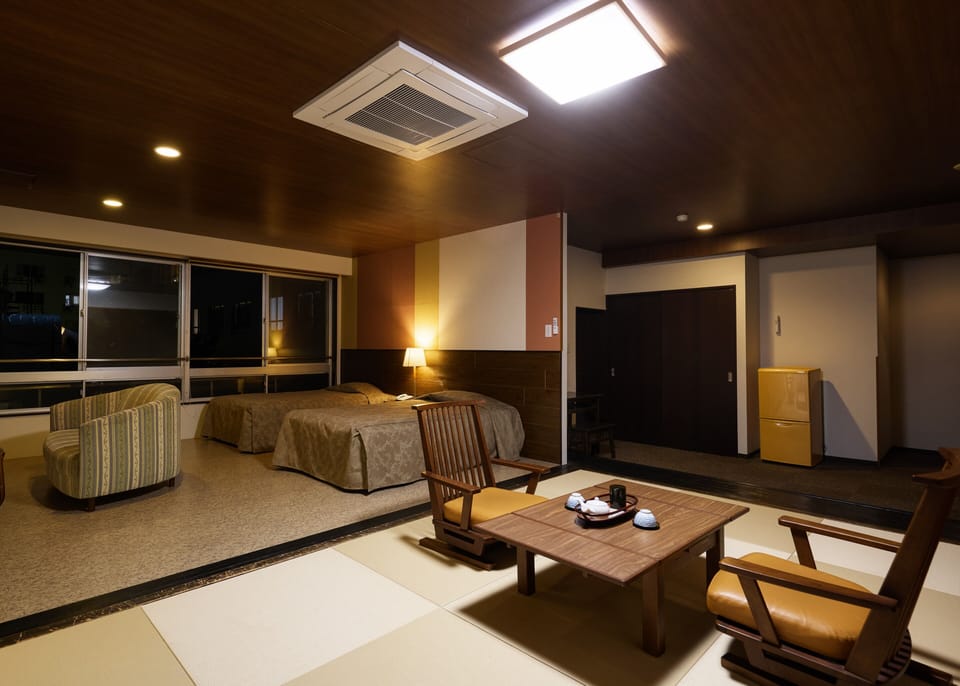 [Asian Suite]  Special Japanese-Western Room (Night View Side), Non Smoking | In-room safe, blackout drapes, bed sheets