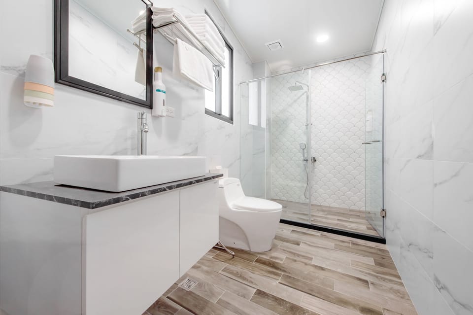 Quadruple Room, Mountain View | Bathroom | Hair dryer, slippers, towels, shampoo