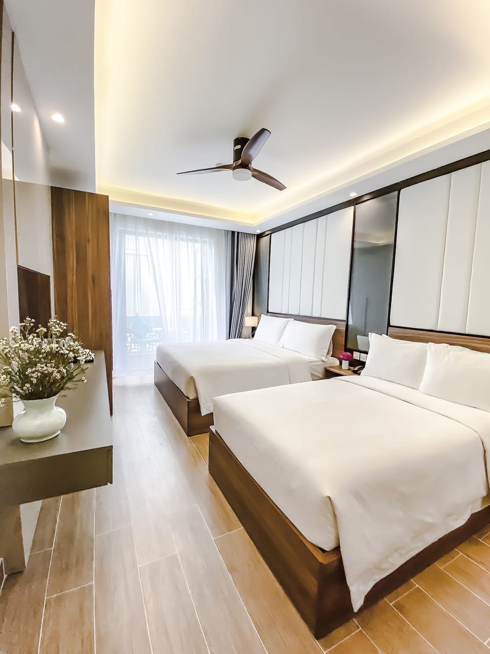 Family Triple Room | Premium bedding, minibar, in-room safe, individually decorated