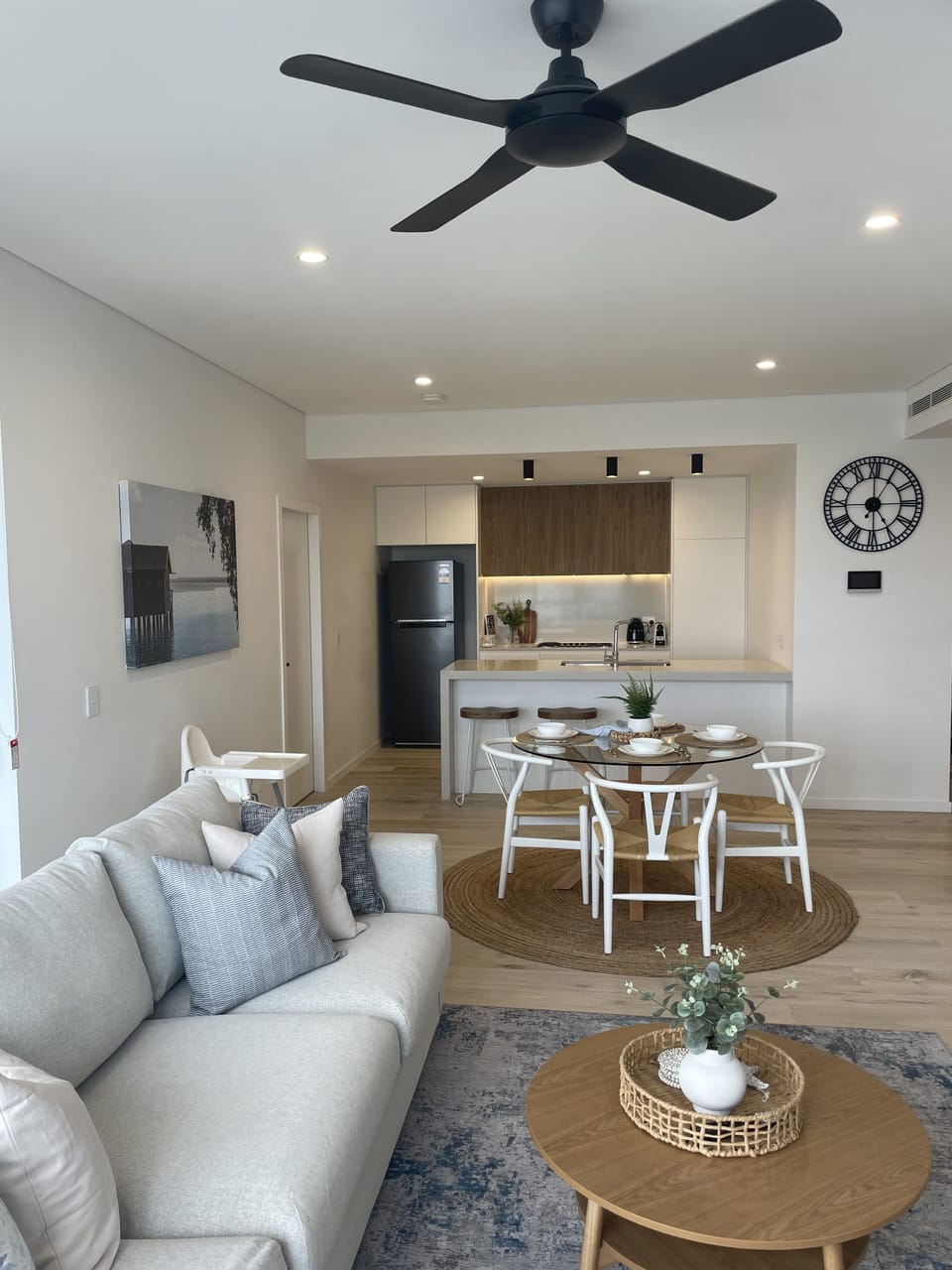 Beautifully appointed open plan kitchen over looking lounge room.