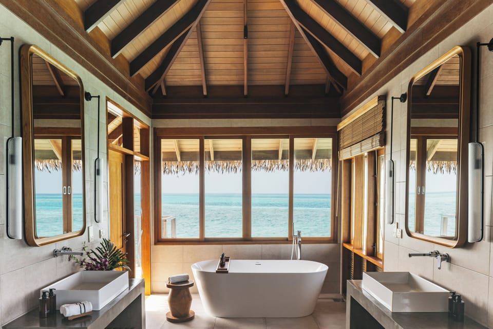 Separate tub and shower, rainfall showerhead, hair dryer, slippers
