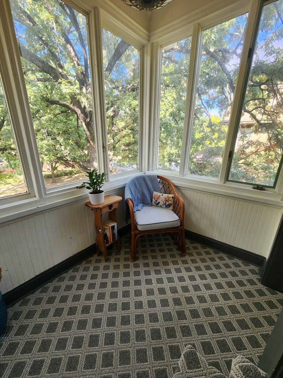 Small landing area after first flight of stairs turned into reading nook.