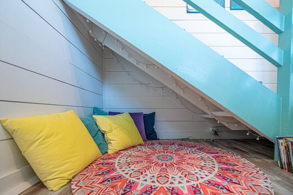 The kids reading nook with books is a favorite of our girls when they want to curl up with a book. 