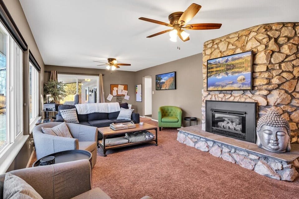 Living room with sofa sleeper for additional guests.. Kids art corner in the back.