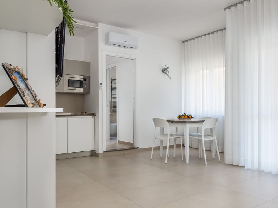 Comfort Apartment | Living area | 43-inch LED TV with cable channels, TV