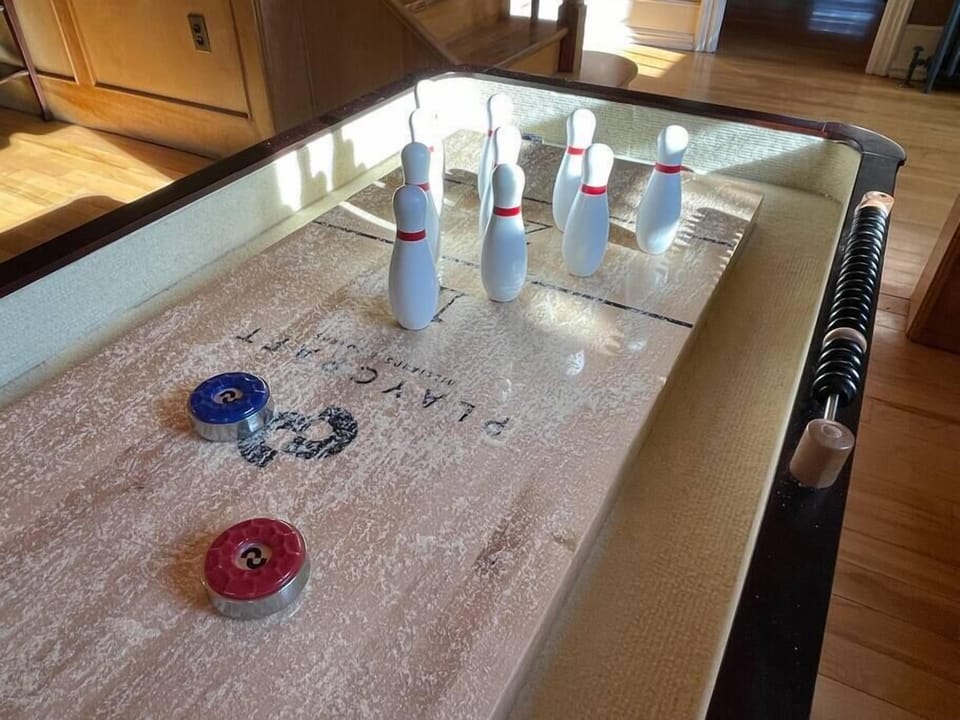 Shuffleboard table and bowling!