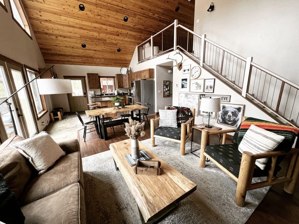 Open living, dining, and kitchen area 