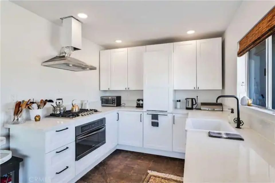 New spacious kitchen. Lots of storage and amenities.