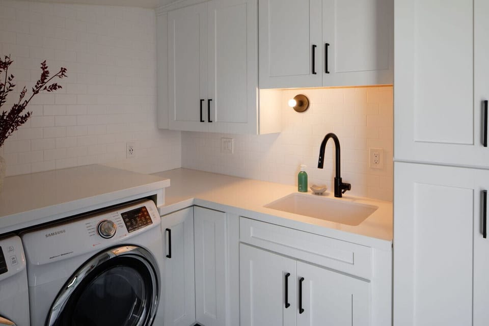Custom Tiles, Large Quartz Sink and Modern Hardware