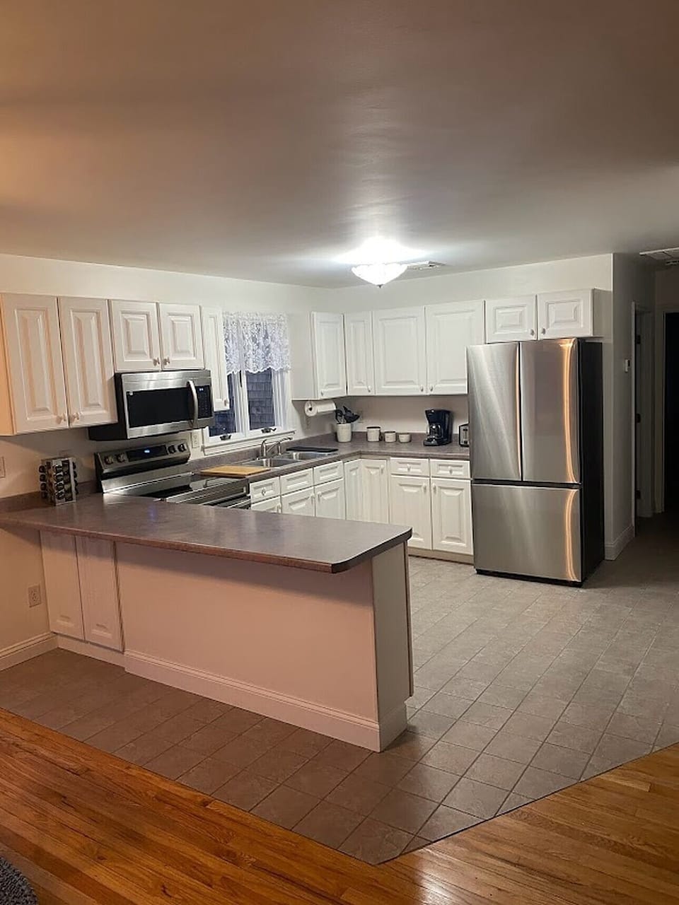 Kitchen has new appliances. No dishwasher