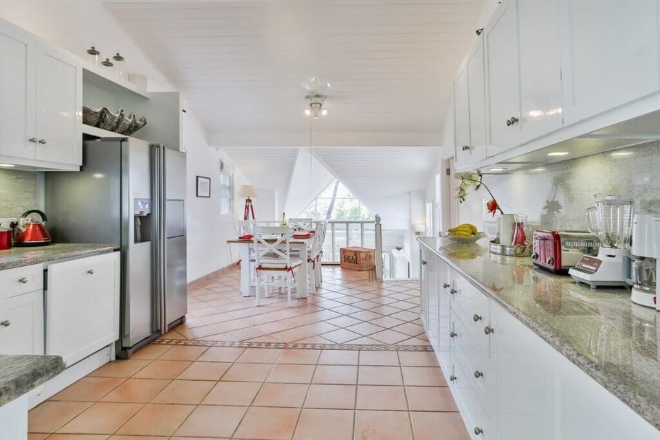 Kitchen looking over to dining table.