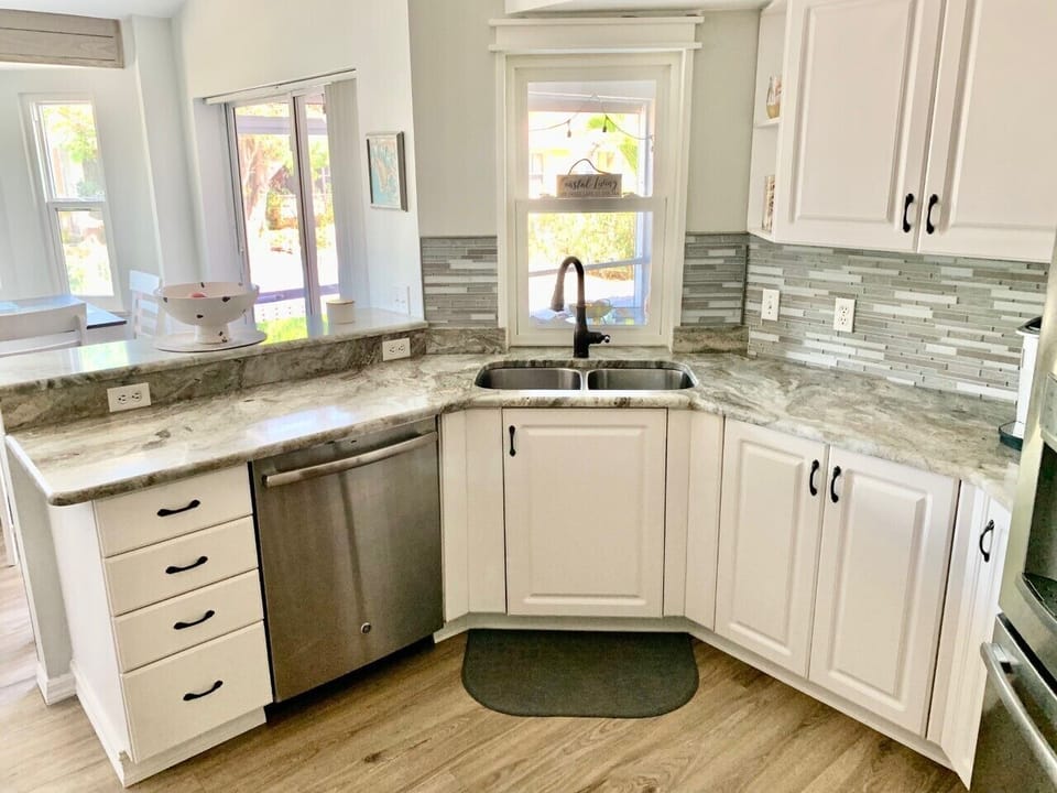 RENOVATED KITCHEN  IS CLEAN AND LOADED WITH ALL ESSENTIALS INCLUDED