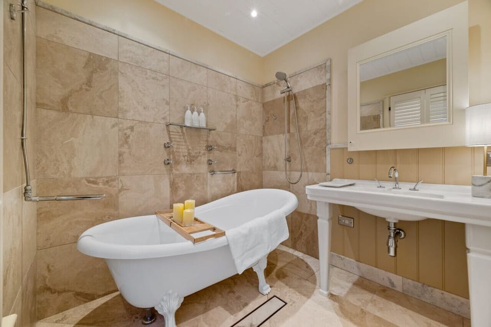 The master ensuite has a full bath - perfect for a relaxing soak