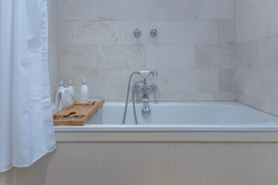 gorgeous large bath tub, and a bath outdoors!