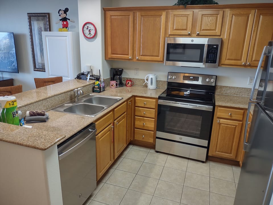 Updated kitchen with dishwasher, microwave, oven, fridge and more!