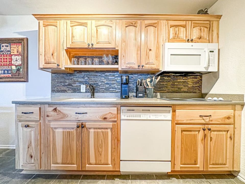 Whether you`re preparing a gourmet meal or reheating leftovers, our well-appointed kitchen makes dining in a delightful experience during your getaway.