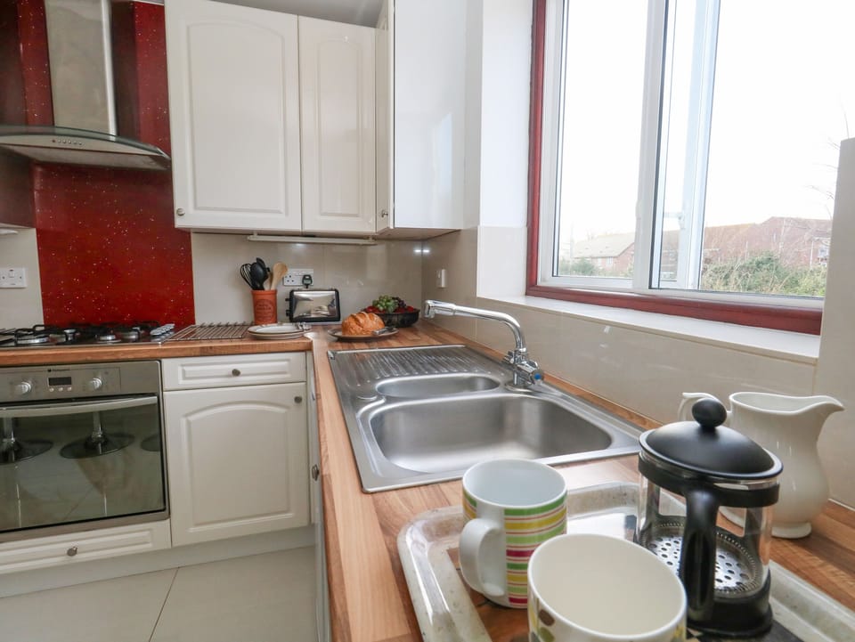 Fridge, dishwasher, electric kettle, toaster