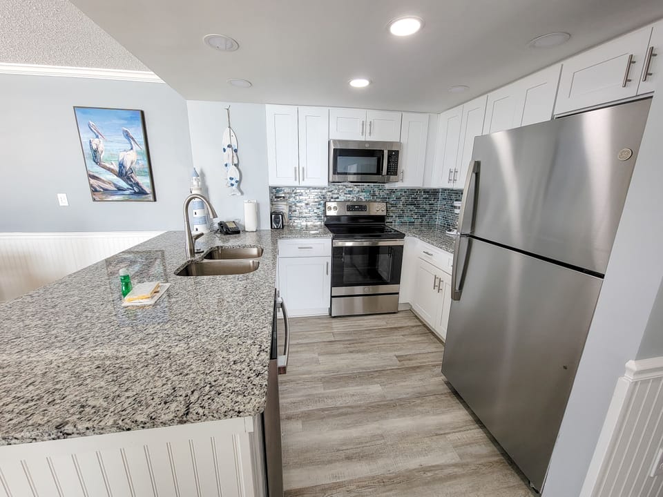 Condo, 2 Bedrooms | Private kitchen | Coffee/tea maker, fridge, oven, toaster