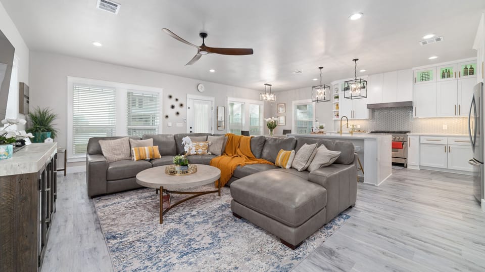 Ease on into your stay by kicking back in this thoughfully designed living room.