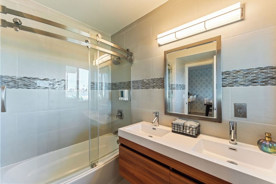 Guest-Friendly Main Bathroom Clean and convenient, this bathroom is centrally located for easy access.