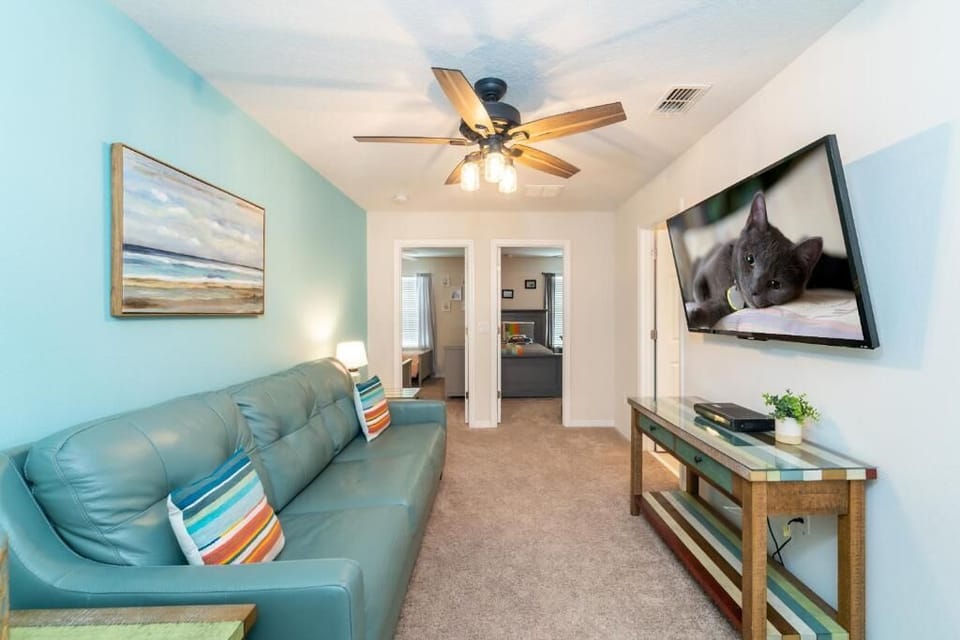 Comfortable Lounge Area in Upstairs Loft with Flat Screen TV