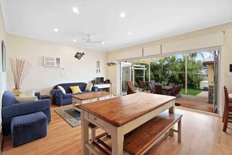 Dining room opens up to under cover alfresco entertaining area