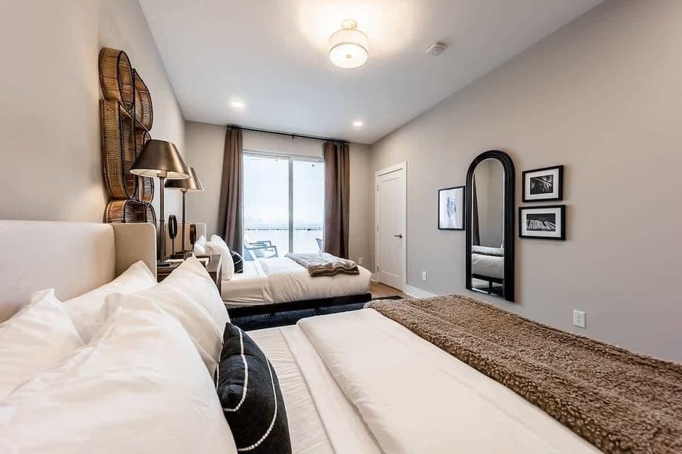 Newly renovated 4th floor guest bedroom with two custom queen over queen bunk beds each with a full trundle (6 beds total / new pictures coming soon) with access to rooftop 