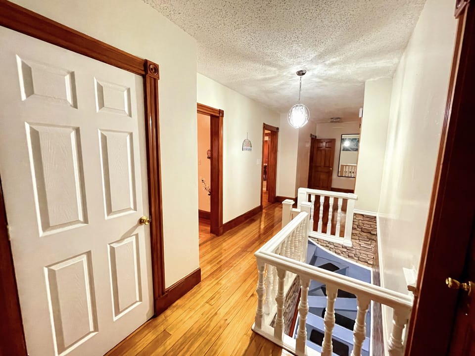 Hallway includes a full size mirror to take selfies on your way out in Boston