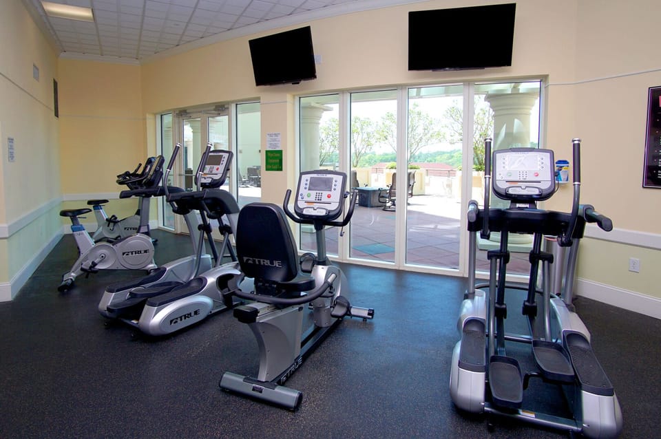 Fitness room with bikes, ellipticals and a treadmill at Mar Vista Grande 607, Ocean Drive