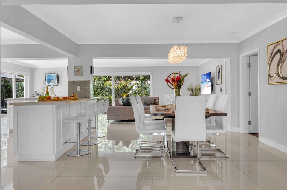 Next to the kitchen is the dining area, that seats six.