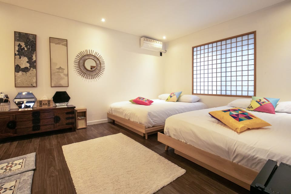 Luxury Quadruple Room, 2 Queen Beds, Private bathroom outside the room | Individually decorated, individually furnished, iron/ironing board