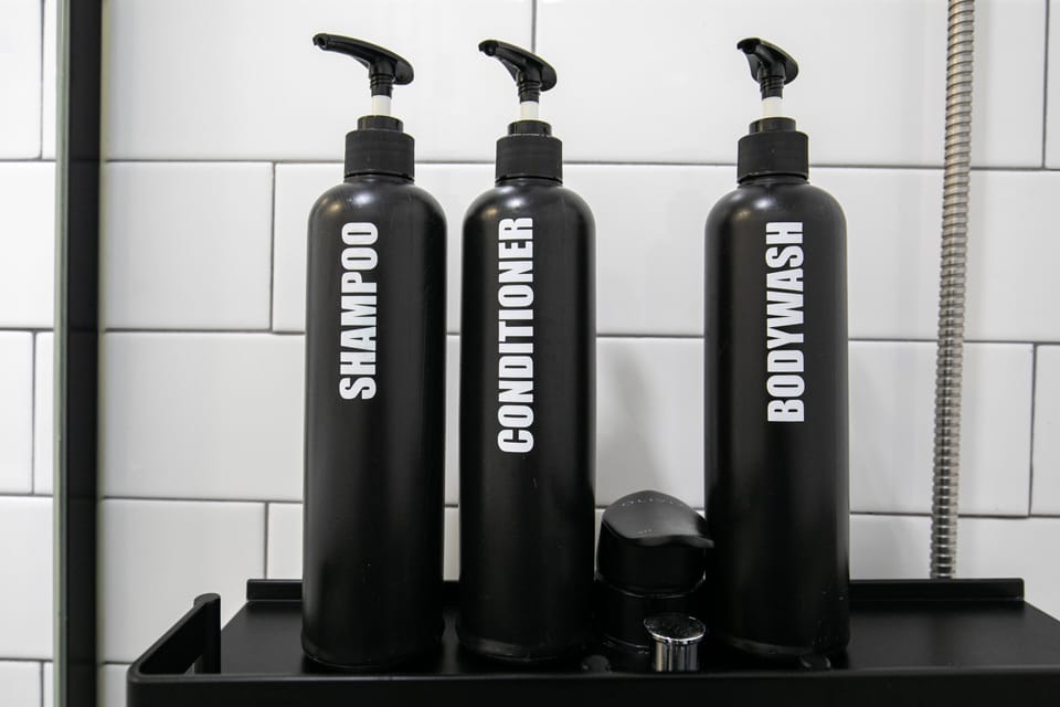 Shower, free toiletries, hair dryer, slippers