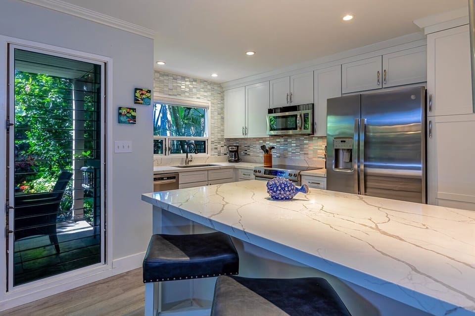 Condo, 2 Bedrooms | Private kitchen | Coffee/tea maker, fridge, oven, dishwasher