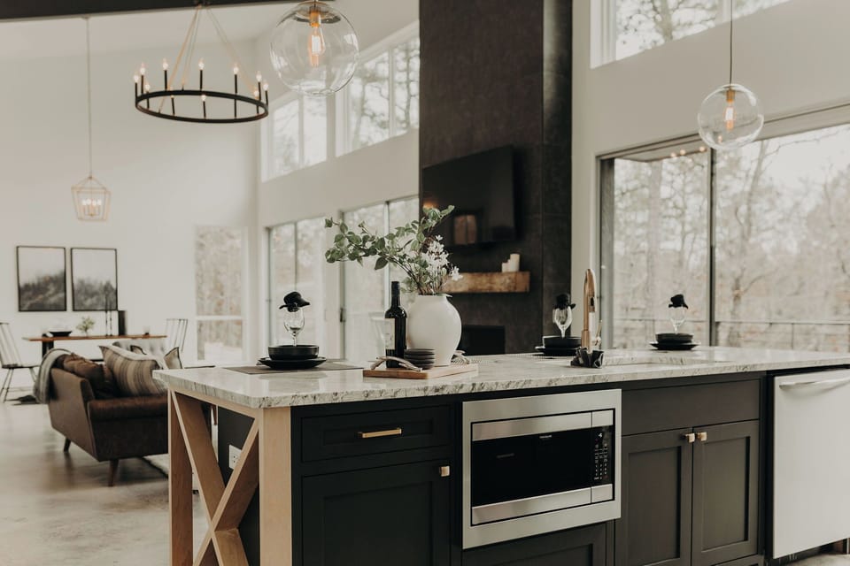 Kitchen: Modern design meets nature with stunning views and a stylish island for culinary adventures!