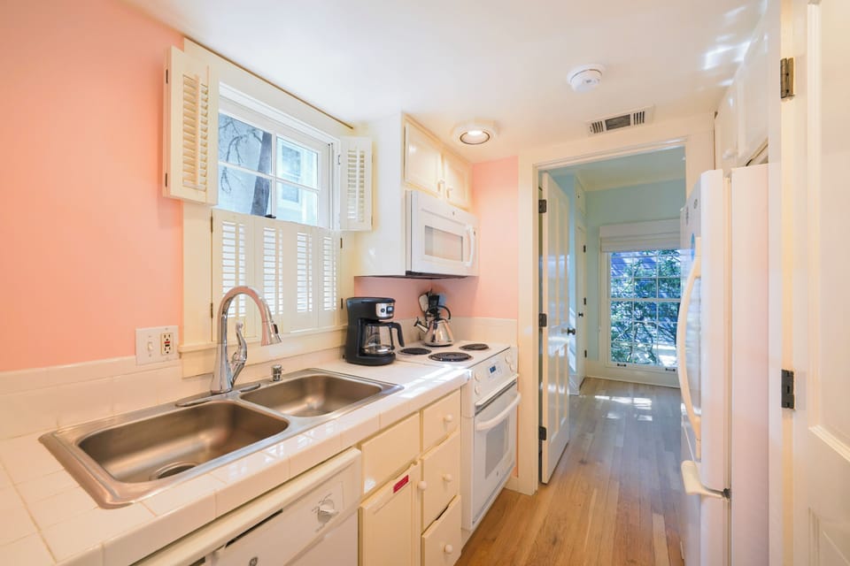 ADJACENT FULLY EQUIPPED KITCHEN