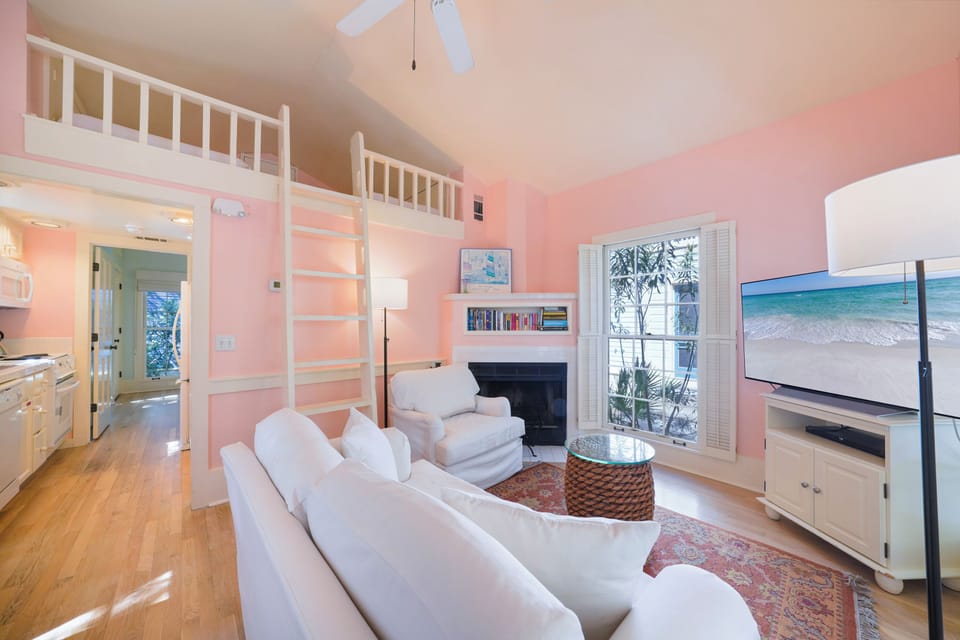 LIVING WITH FLATSCREEN TV AND SEATING FOR ALL