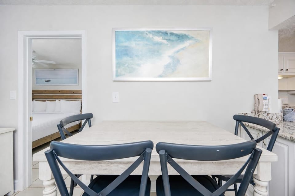 Gather around the table, sharing laughter and stories as you savor easygoing moments in this welcoming space