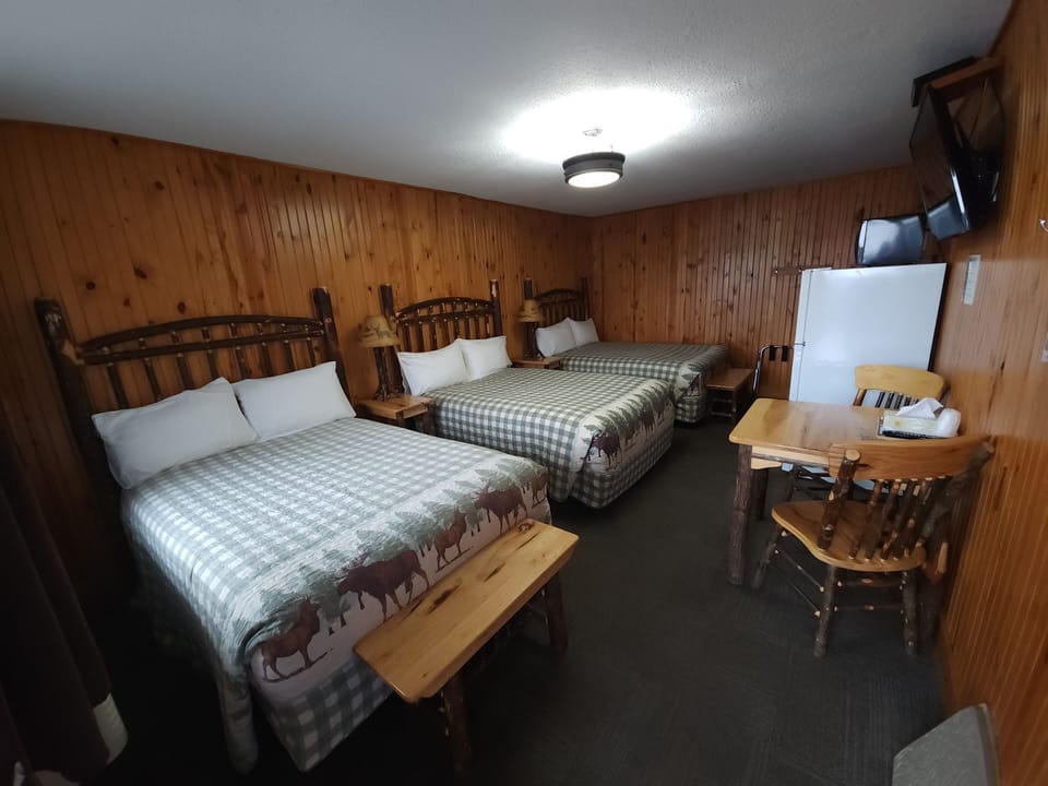 Deluxe Room, Multiple Beds | Laptop workspace, blackout drapes, iron/ironing board, free WiFi