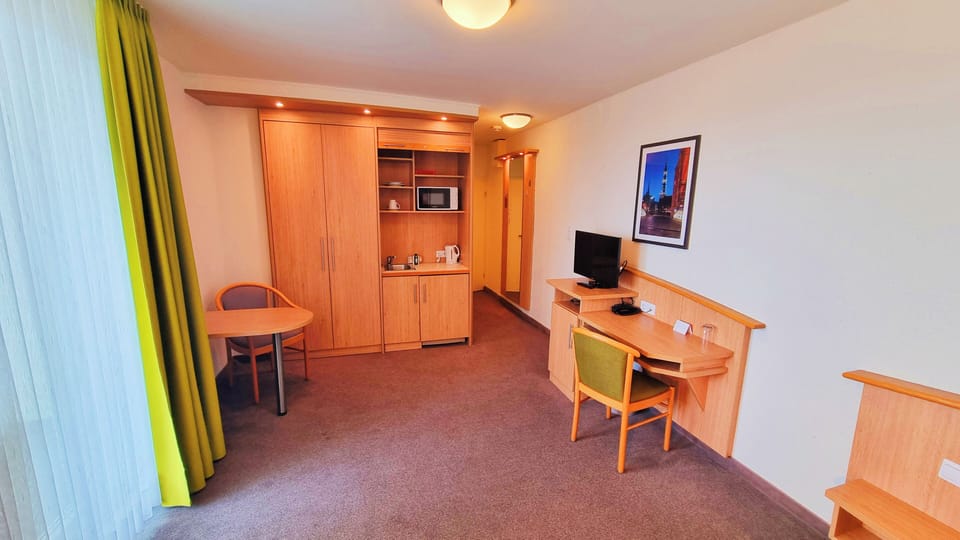 Standard Apartment, Balcony | Private kitchen | Fridge