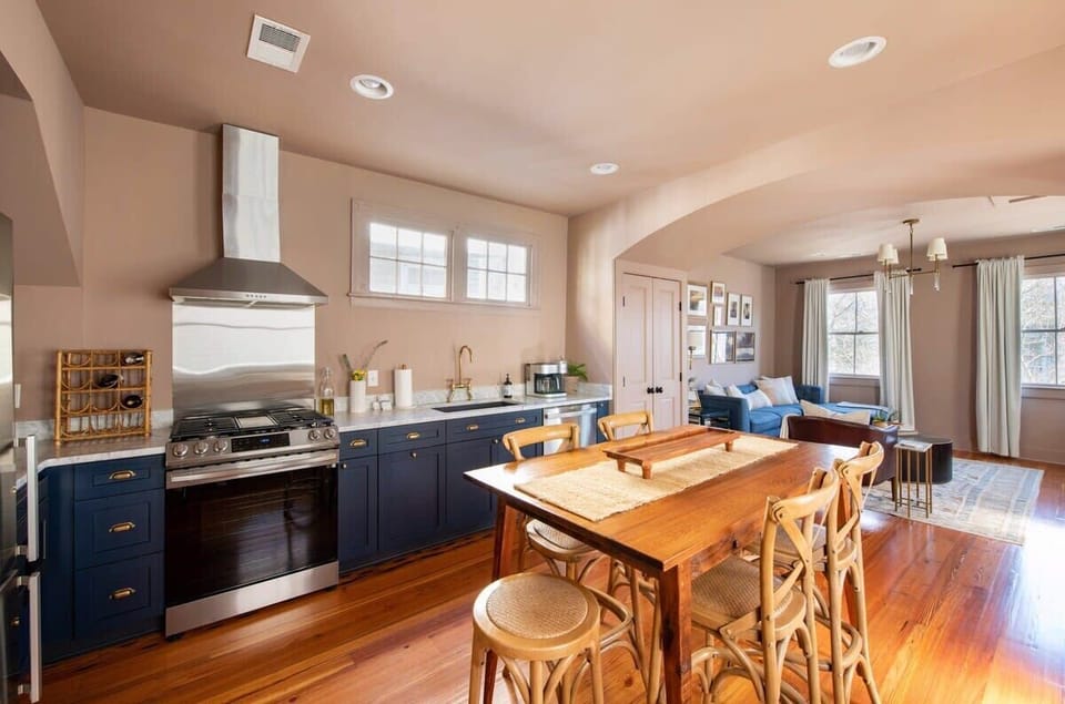 Fully equipped kitchen stocked with diningware, cookware, and modern appliances for easy meals at home.