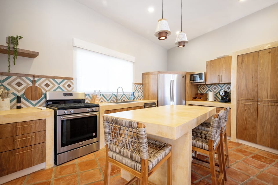 Primary Suite | Private kitchen | Full-size fridge, microwave, oven, stovetop