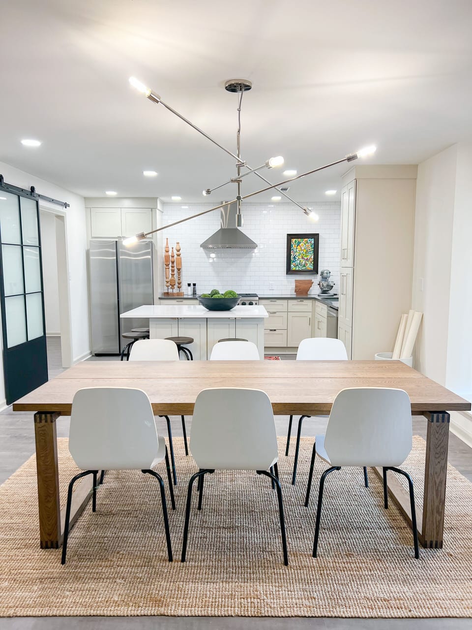 Open floor plan with dining area separating kitchen and living room.
