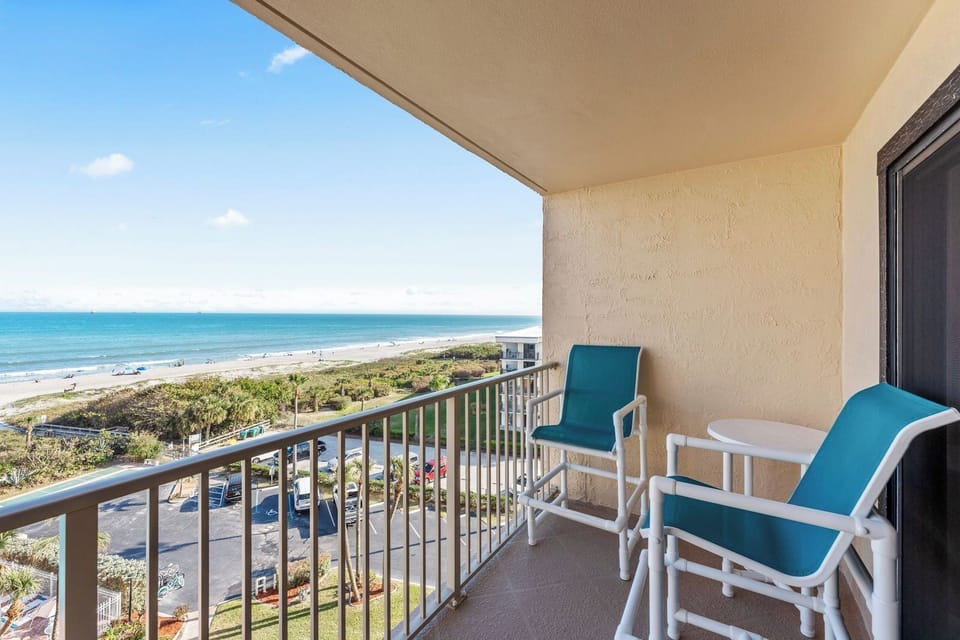 Enjoy morning coffee on a spacious private balcony with a sea breeze.