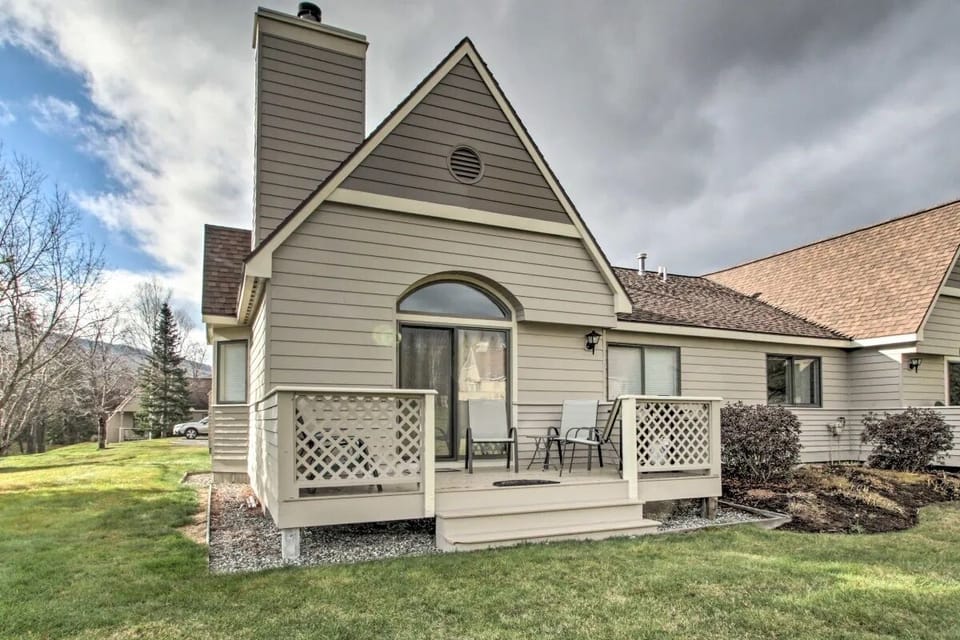 Access to the back deck with expansive shared lawn!