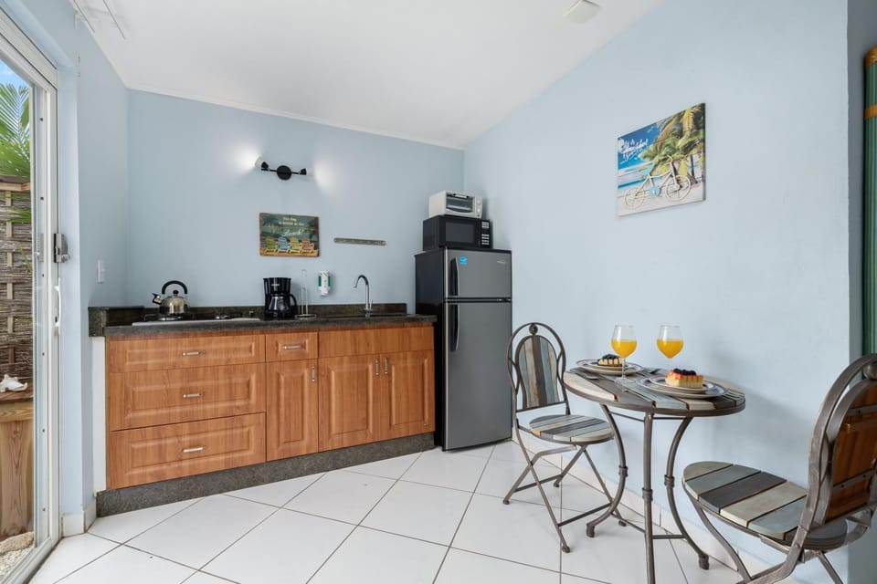 This studio is a bright, welcoming space with a great poolside view.